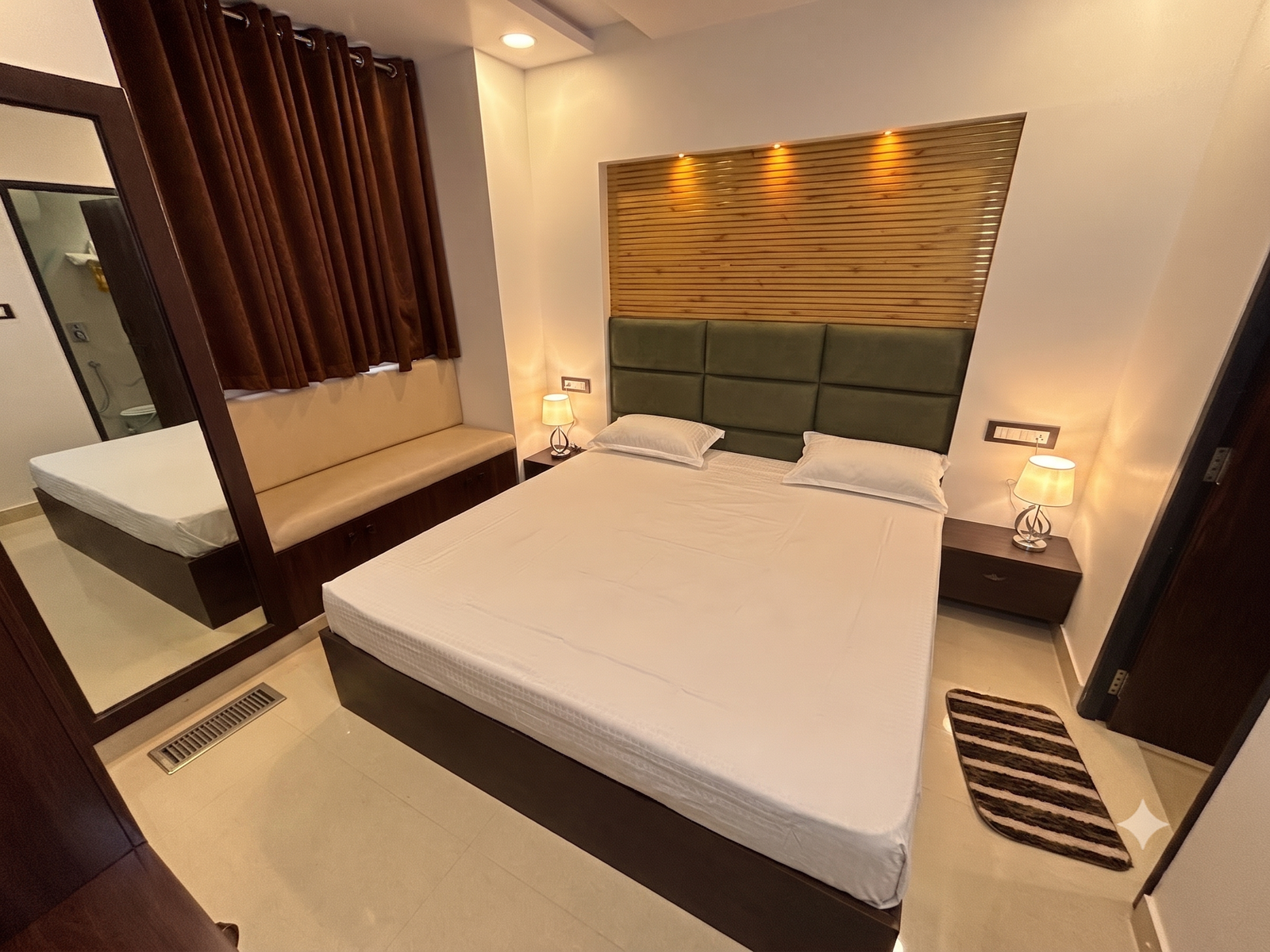 A luxury homestay room at Varghese Luxury, Jagdalpur